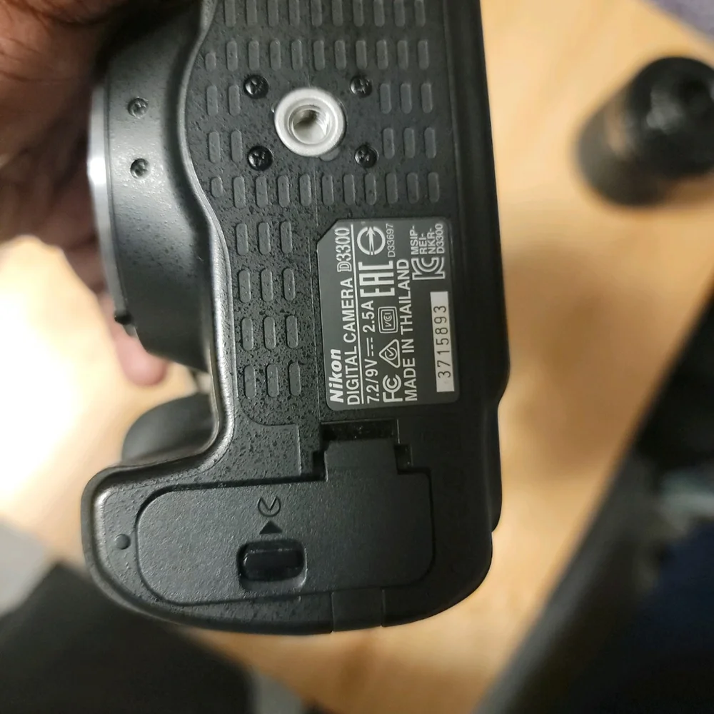 Nikon D3300, 18-55mm lens, 55-200mm lens, and power adapter